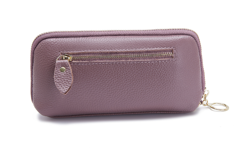 Шкіряний гаманець косметичка з ремінцем на руку А03-КТ-10218 Фіолетовий